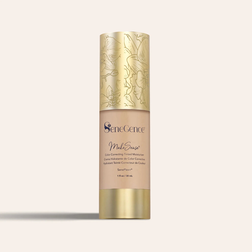 MakeSense Color Correcting Tinted Moisturizer in a beige bottle with a decorative gold floral cap